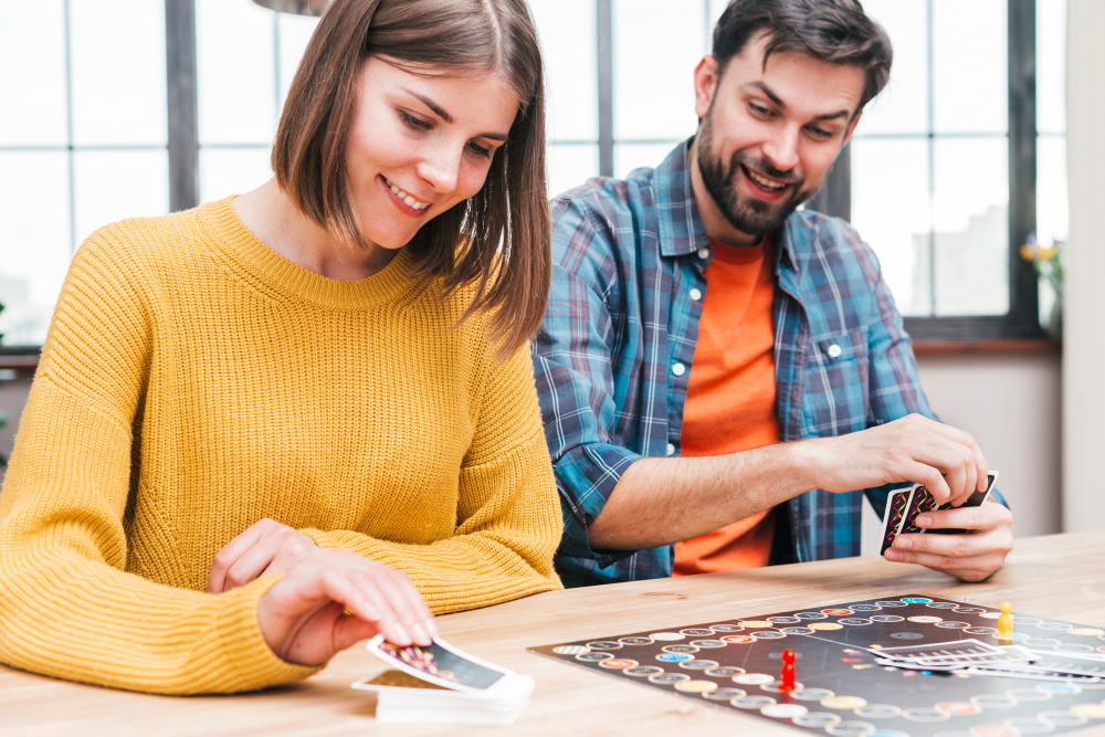 happy-husband-wife-playing-business-card-game